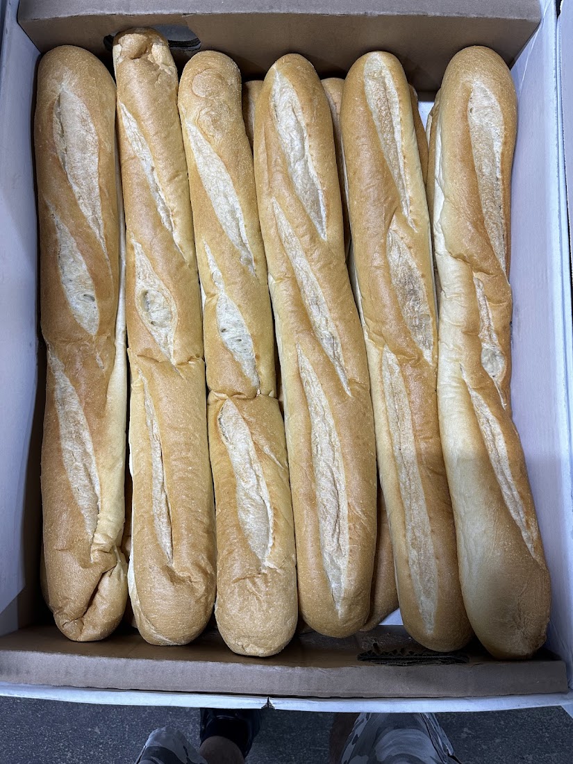 Fresh Italian long rolls in delivery box